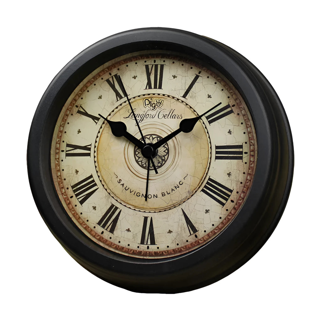 European retro style round desk alarm clock with silent sweep movement on a wooden surface.