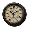 European retro style round desk alarm clock with silent sweep movement on a wooden surface.