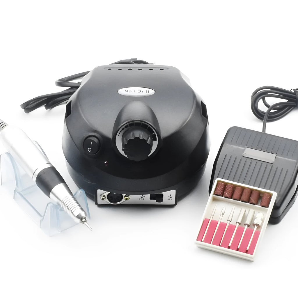 Nail 202 sander in pink with handpiece, foot switch, and grinding heads on a white background