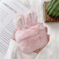 ISIDO brand pink silicone AirPods case cover with rabbit ears, shown next to a grey option.