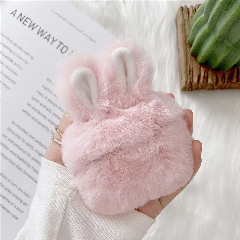 ISIDO brand pink silicone AirPods case cover with rabbit ears, shown next to a grey option.