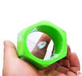 Yellow and green spiral vegetable cutter kitchen gadget for slicing cucumbers.