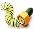 Yellow and green plastic spiral vegetable cutter showing 8cm diameter and spiral cutting mechanism