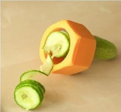 Yellow and green plastic spiral vegetable cutter showing 8cm diameter and spiral cutting mechanism