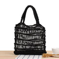 A square medium woven straw shoulder bag in a national style, shown with double handles in a choice of colours.