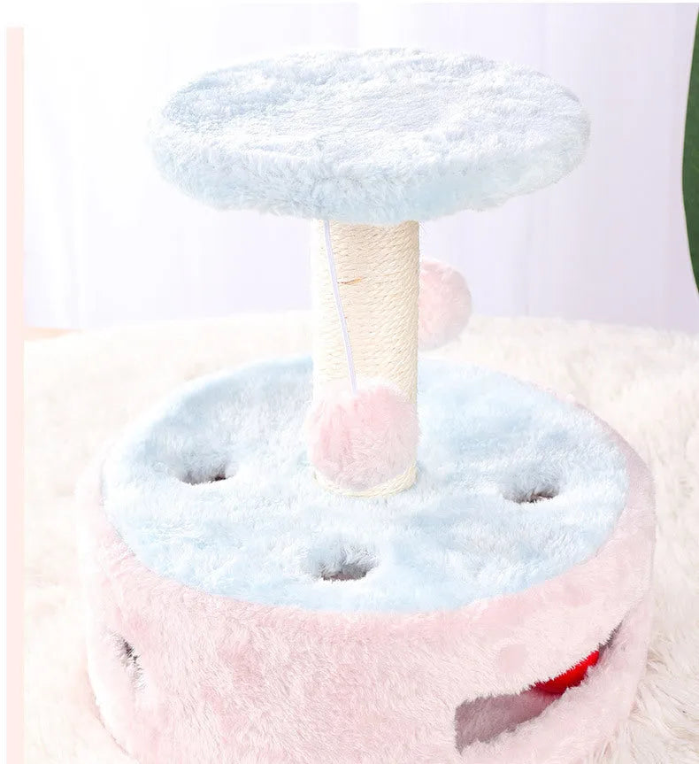 Small cat climbing frame with plush platform and sisal scratching post against a neutral background