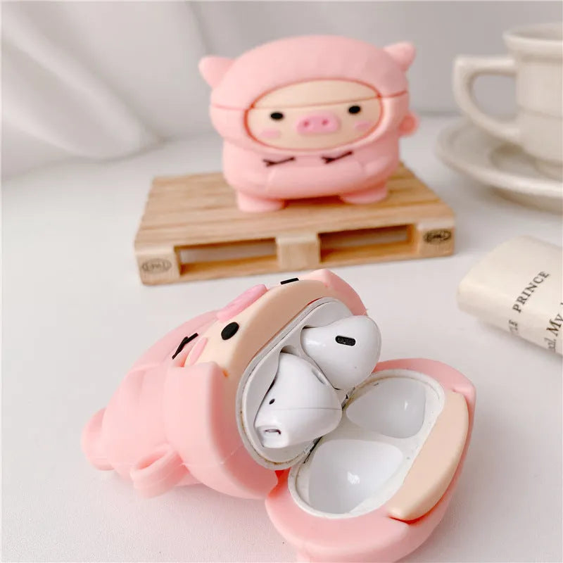 Pink cartoon pig design soft silicone flip case for Apple AirPods with a keychain hook.