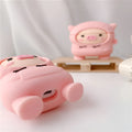Pink cartoon pig design soft silicone flip case for Apple AirPods with a keychain hook.