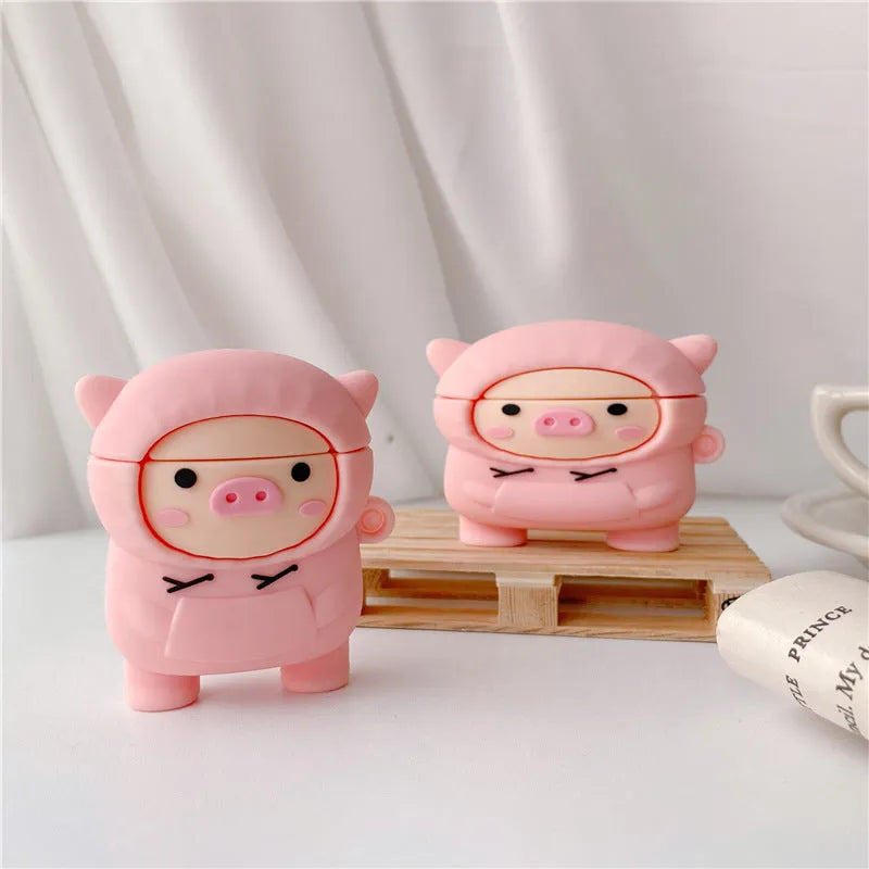 Pink cartoon pig design soft silicone flip case for Apple AirPods with a keychain hook.