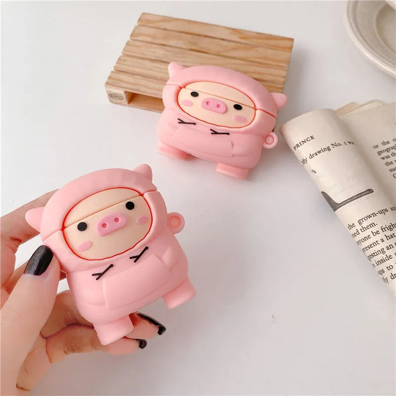 Pink cartoon pig design soft silicone flip case for Apple AirPods with a keychain hook.
