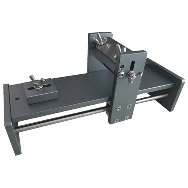 Aluminium alloy fixed angle sharpening tool for woodworking planers, chisels and carving knives on a workbench.