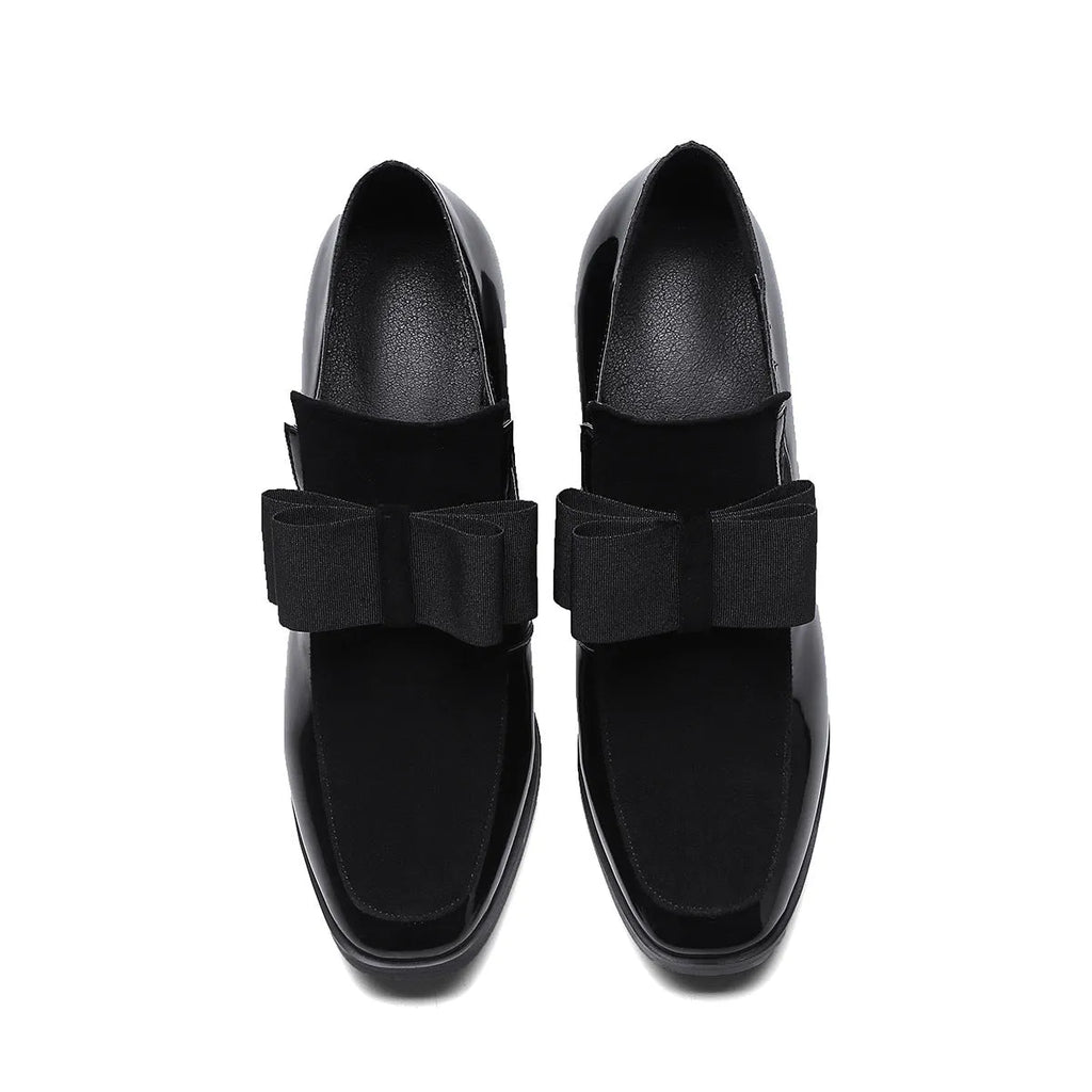 Women's patent leather high heel shoes with thick heels in black colour showing square toe design