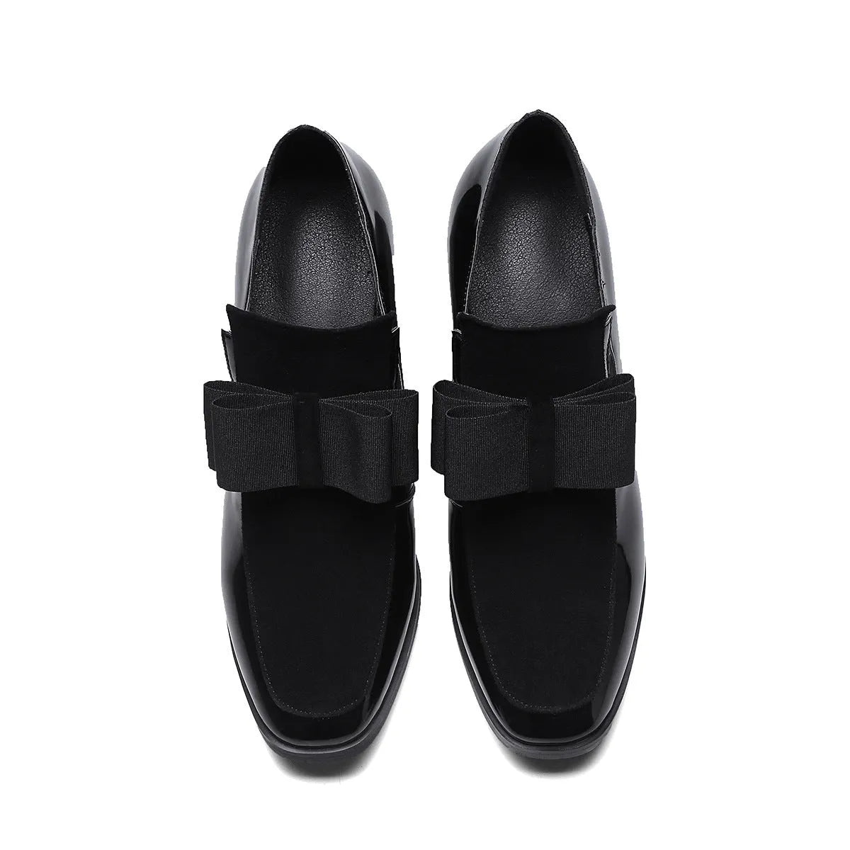 Women's patent leather high heel shoes with thick heels in black colour showing square toe design