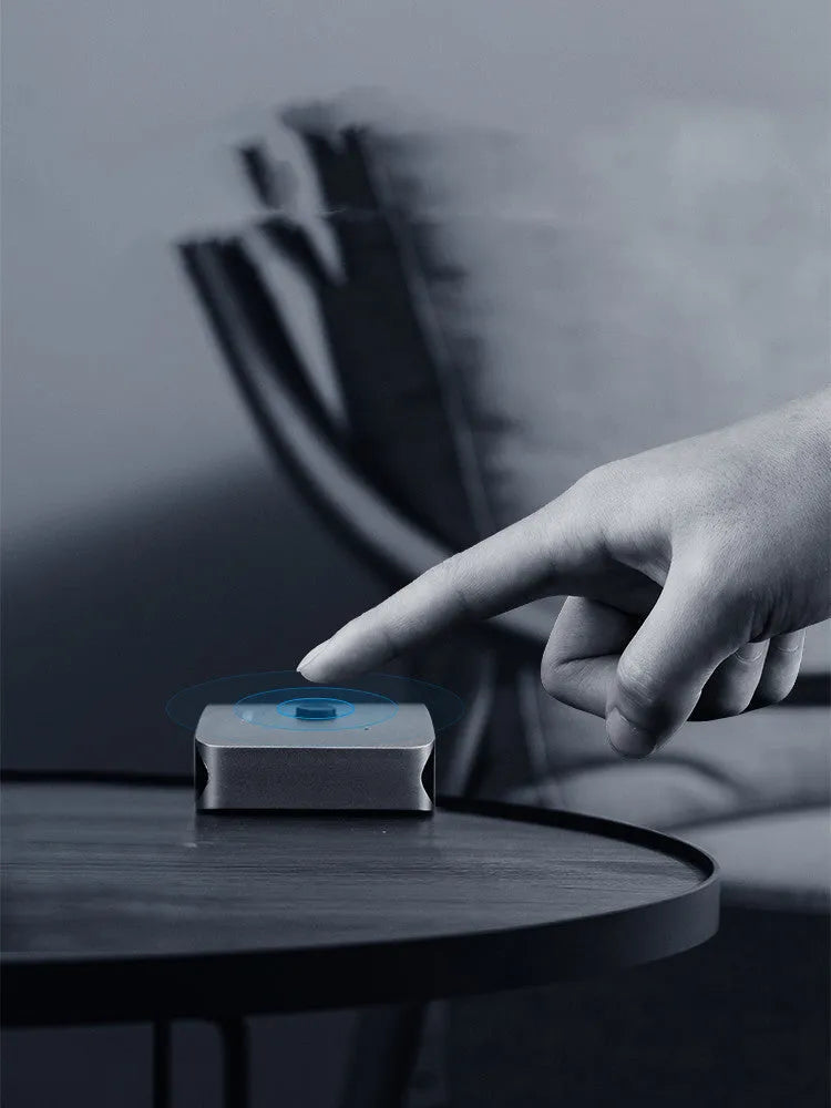Grey Haibeisi HDMI switcher box with two input ports and one output port for 4K video sharing.