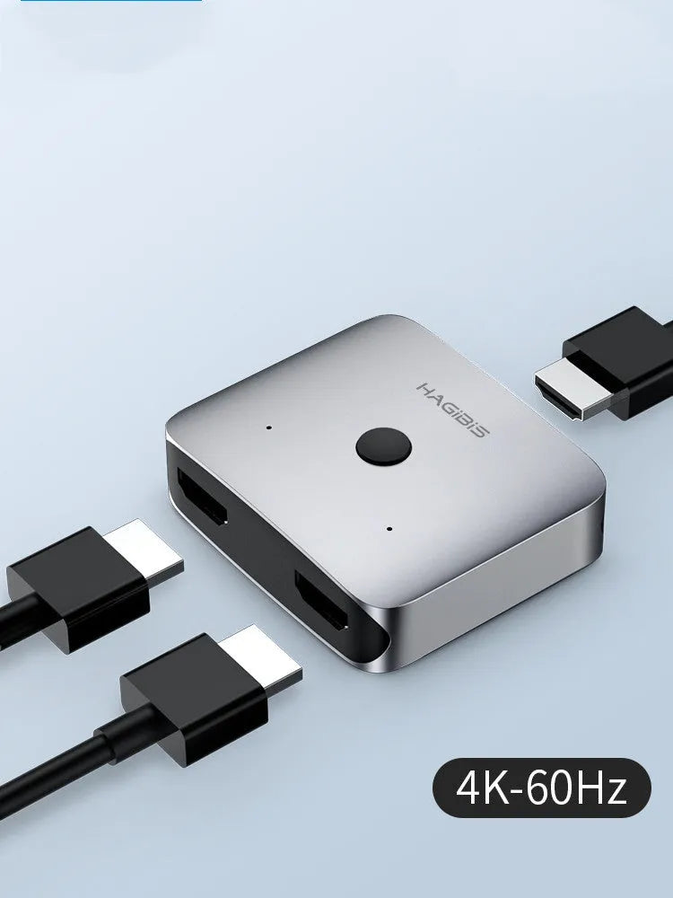Grey Haibeisi HDMI switcher box with two input ports and one output port for 4K video sharing.