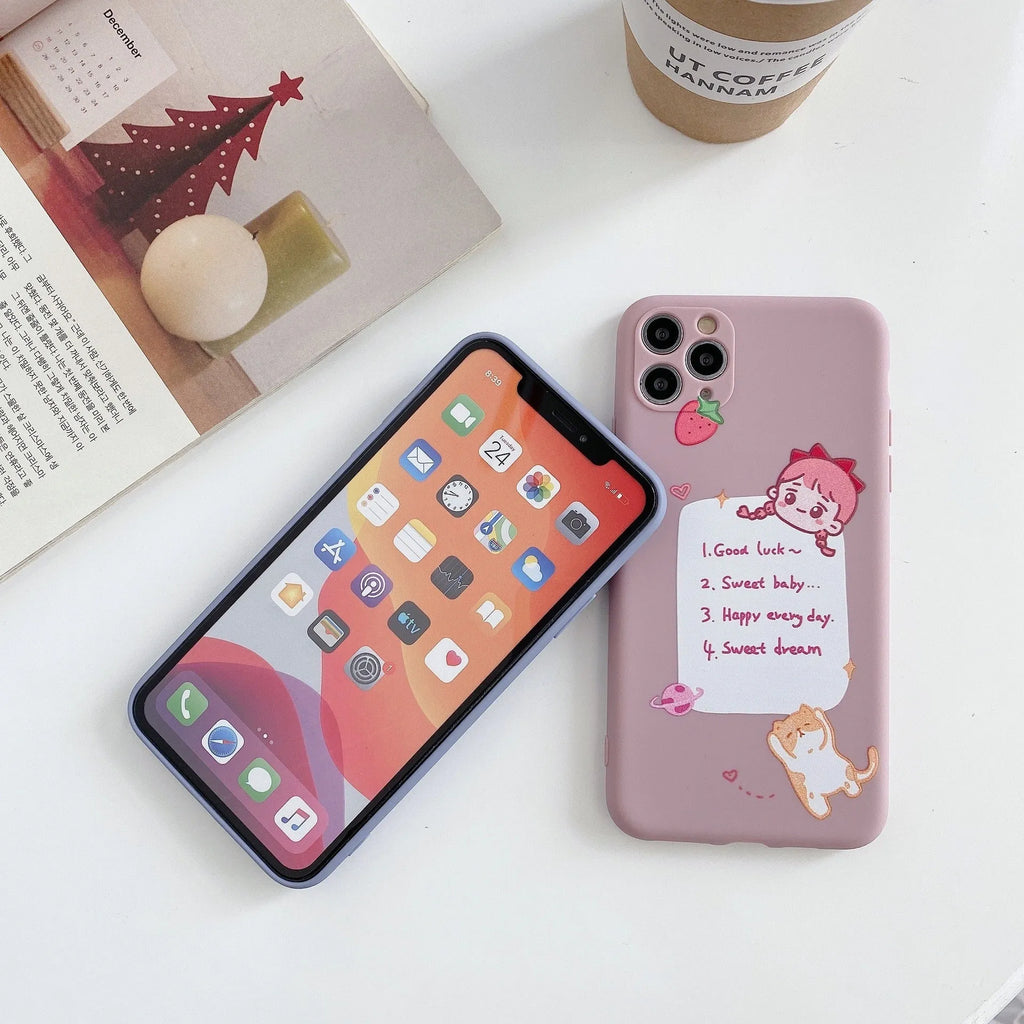 Blue soft shell iPhone case with printed cartoon dinosaur design, shown next to a pink version with a cat girl print.