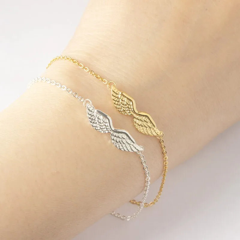 Gold angel wing charm bracelet for women copper electroplate Korean style on white background