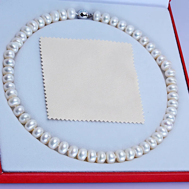 Dailan white freshwater pearl necklace with 10-11mm steamed bread round pearls and simple geometric design