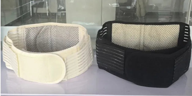 Black self-heating magnetic waist protection belt with adjustable strap on a grey background.