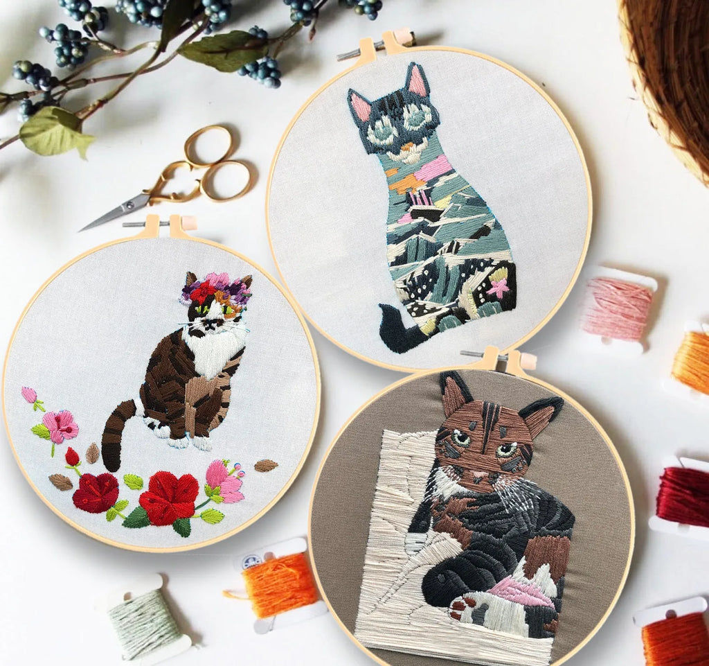 Cat themed DIY cross stitch kit for beginners with embroidery hoop and materials for 3D design.