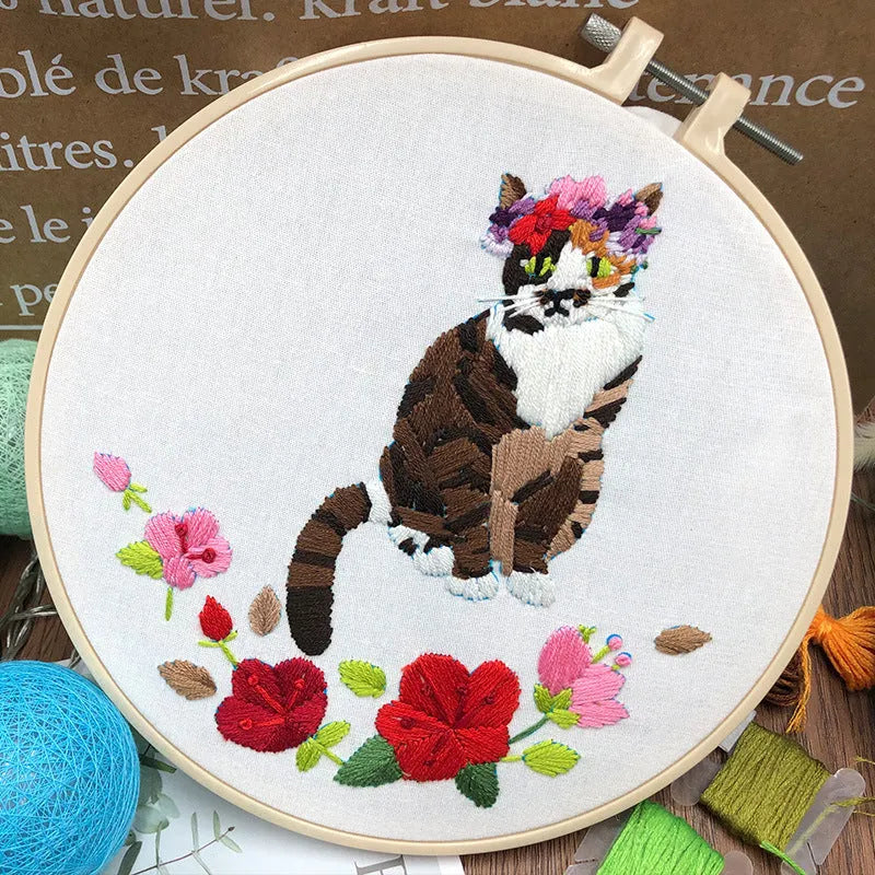 Cat themed DIY cross stitch kit for beginners with embroidery hoop and materials for 3D design.