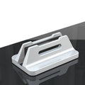 Silver aluminium alloy vertical laptop storage bracket on desk holding a notebook computer