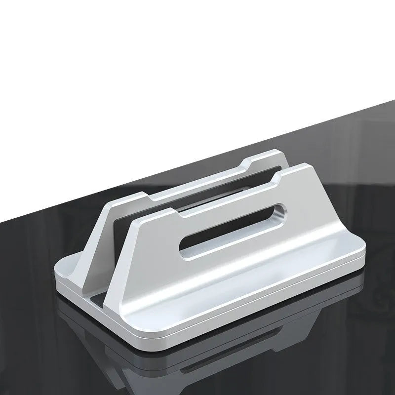 Silver aluminium alloy vertical laptop storage bracket on desk holding a notebook computer