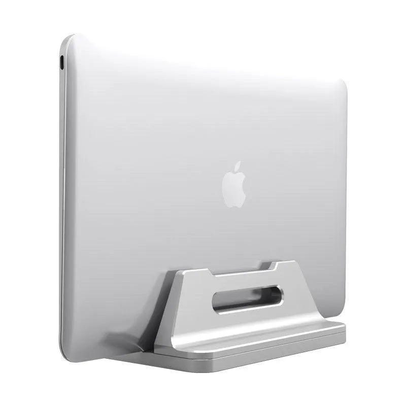 Silver aluminium alloy vertical laptop storage bracket on desk holding a notebook computer
