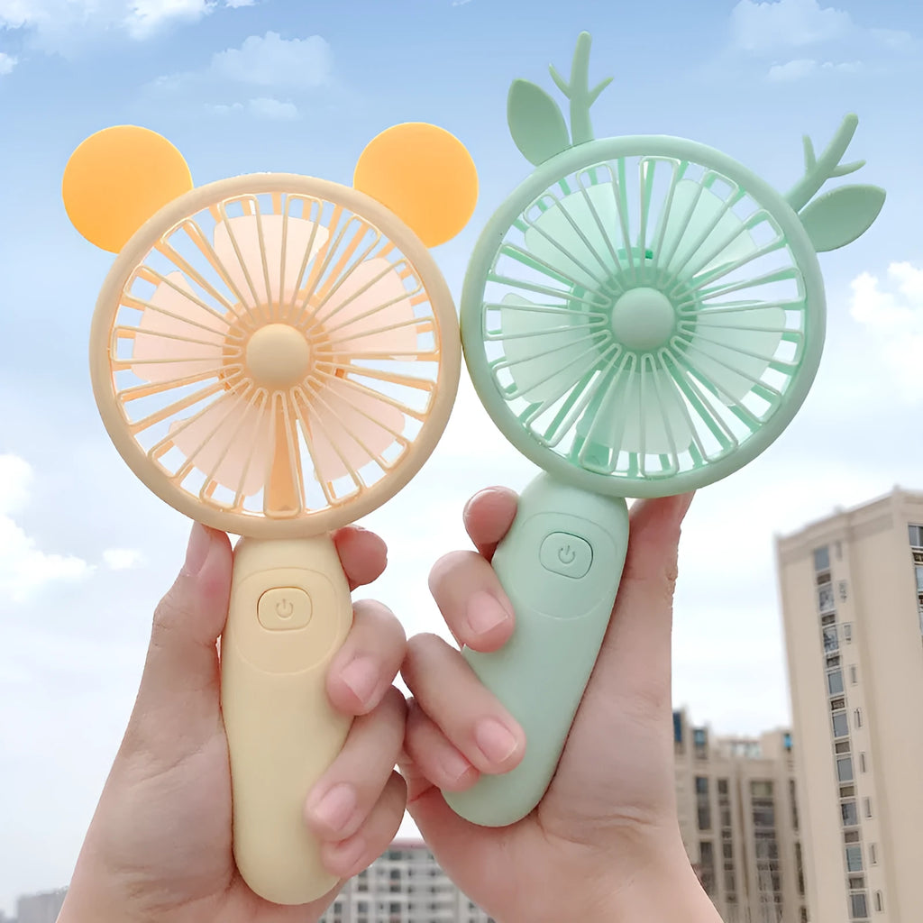 Small blue cartoon-style handheld USB rechargeable mini fan with plastic blades.