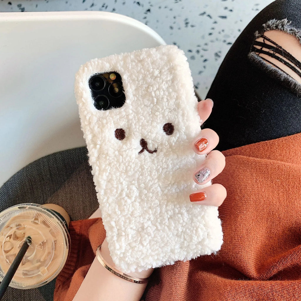 Brown and white embroidered plush bear face cartoon design on a soft TPU iPhone phone case.