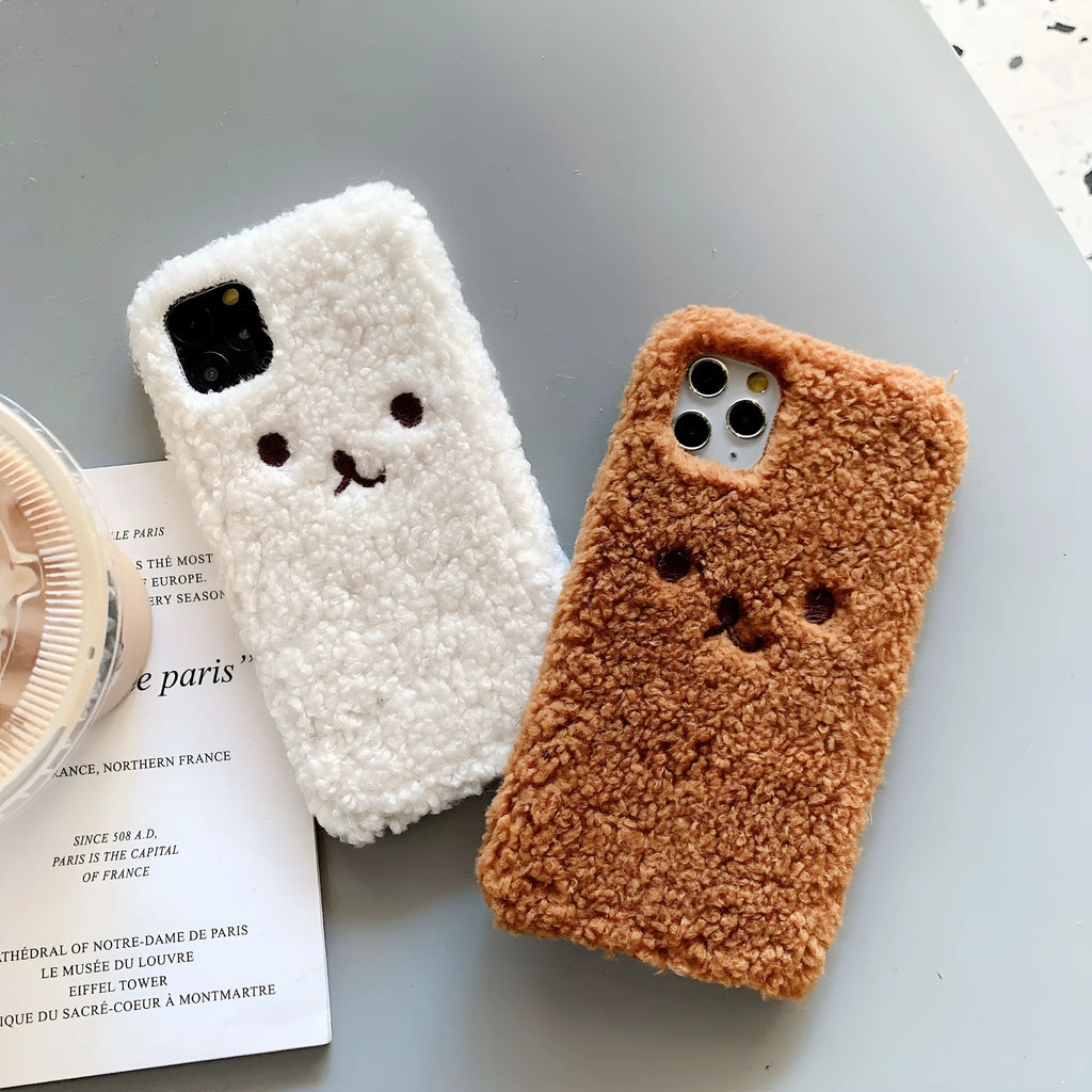 Brown and white embroidered plush bear face cartoon design on a soft TPU iPhone phone case.