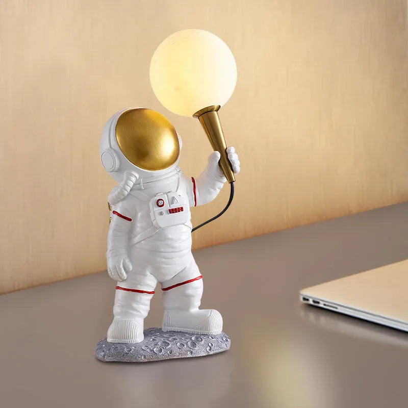 White astronaut desk lamp shown in seated, standing and wall mounted style options