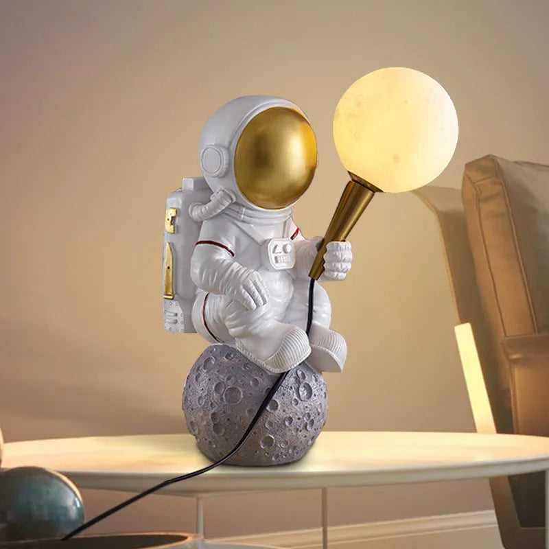 White astronaut desk lamp shown in seated, standing and wall mounted style options