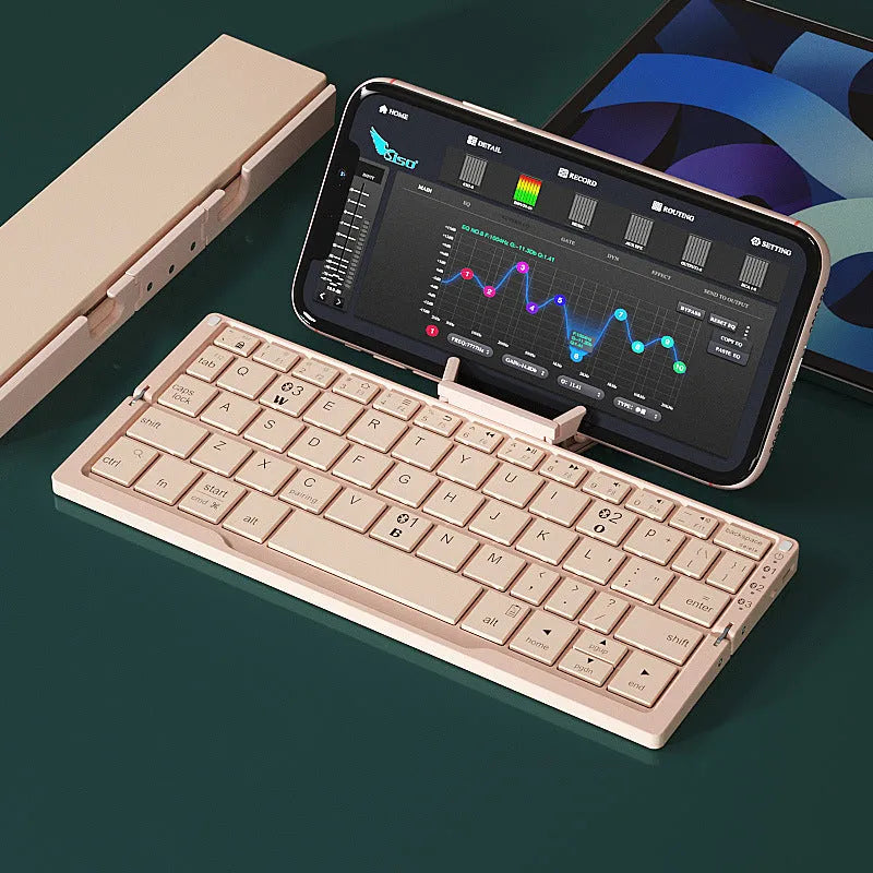 Silver white folding Bluetooth keyboard with integrated phone stand, shown open for typing and folded for storage