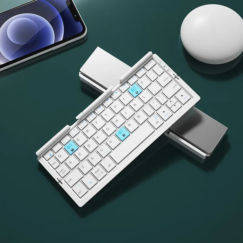 Silver white folding Bluetooth keyboard with integrated phone stand, shown open for typing and folded for storage
