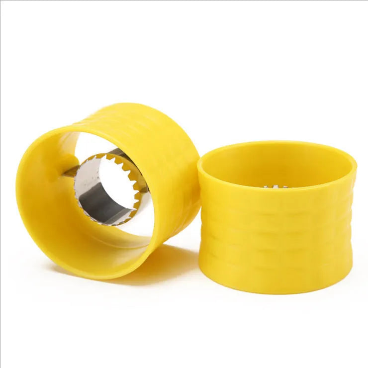 Yellow corn-shaped manual thresher kitchen tool with a non-slip PP grip for removing kernels from corn cobs.