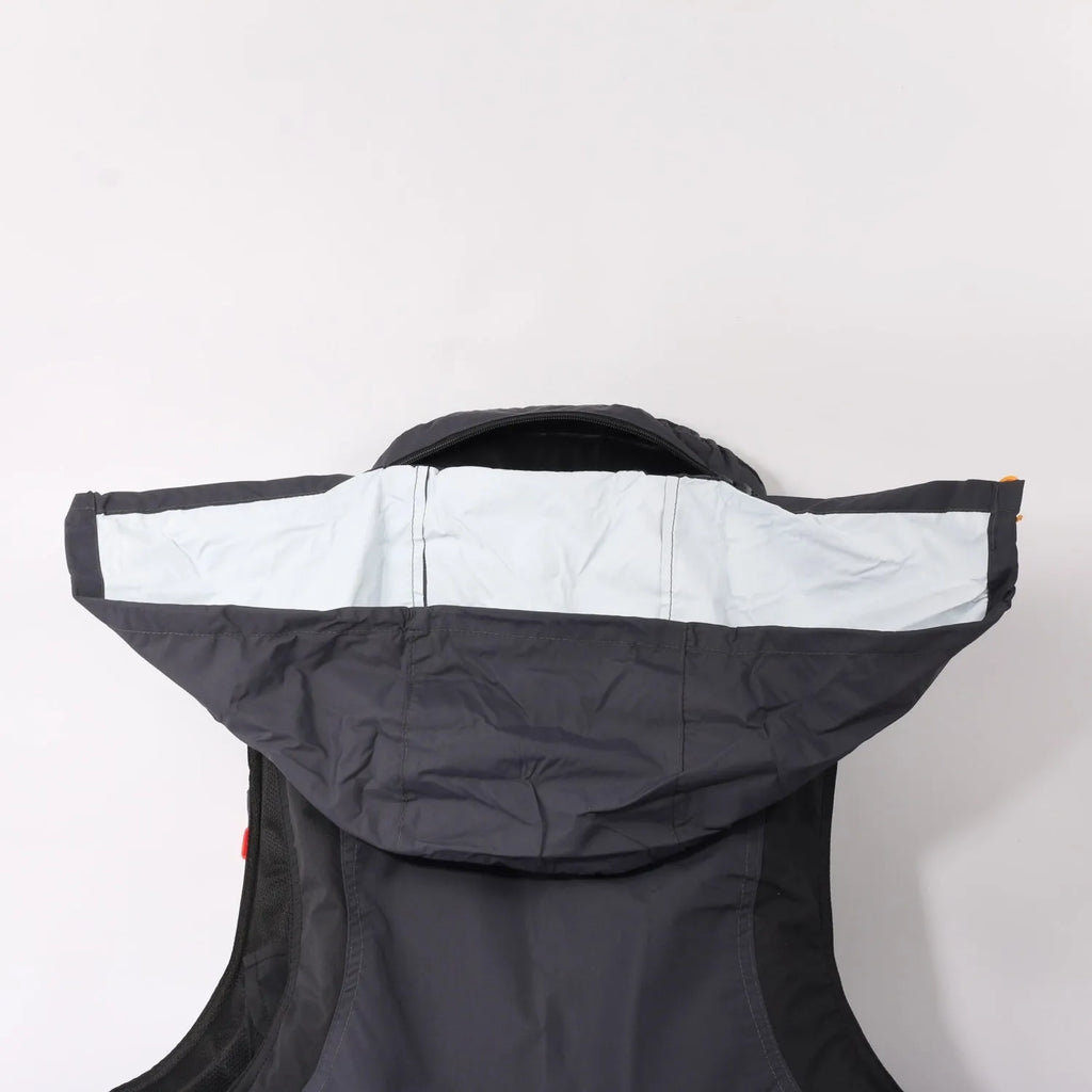 Sea fishing life jacket waistcoat in green with reflective strips and multiple pockets