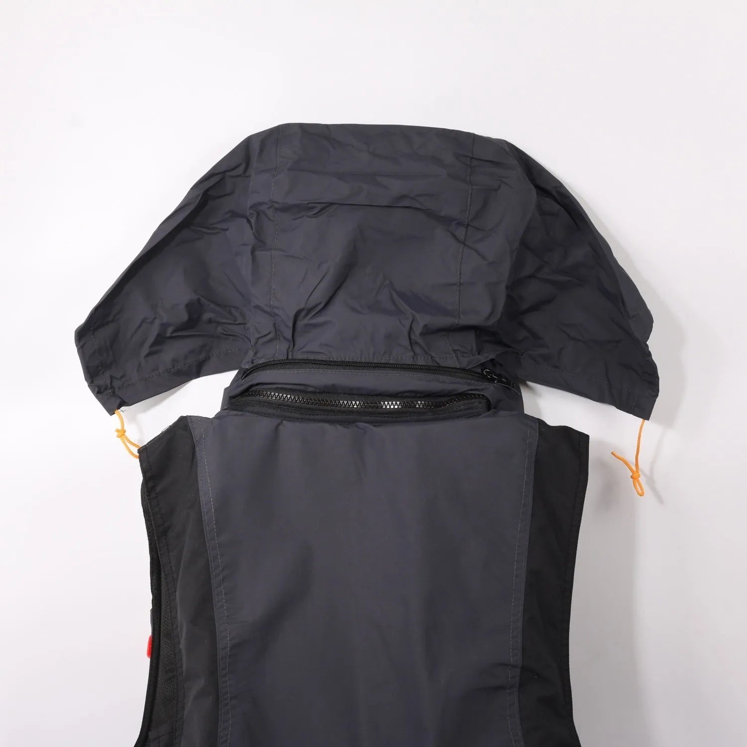 Sea fishing life jacket waistcoat in green with reflective strips and multiple pockets