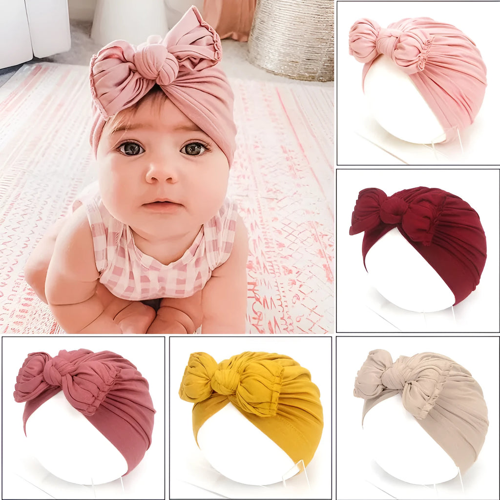 Soft acrylic knitted baby hat for newborns and toddlers in a solid pink colour.
