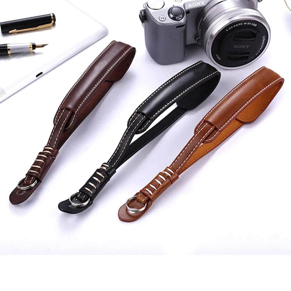 Black and brown camera wrist strap for digital cameras with small mounting holes
