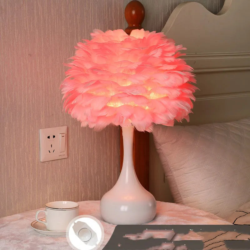 Feather table lamp with hand-woven fur shade on bedside table with adjustable LED lighting