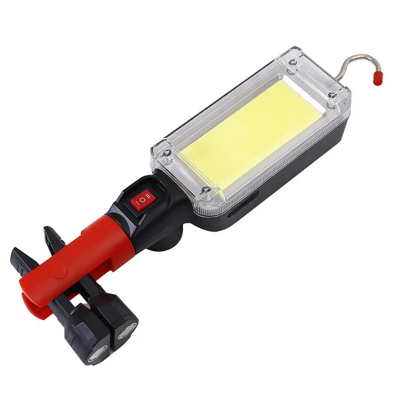 Red portable USB rechargeable COB LED work light with a magnetic hook on the side.