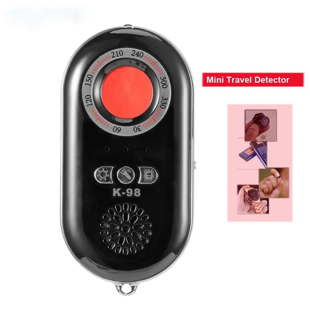 Compact black wireless signal detector alarm with vibration sensor for travel security.