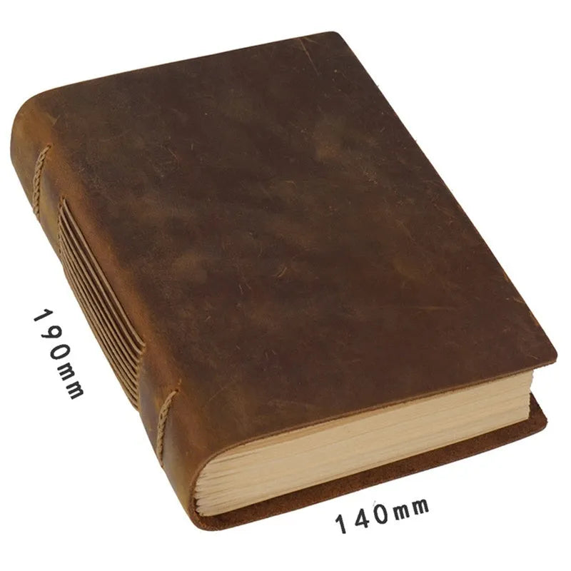 Brown crazy horse leather handmade notebook open on a wooden surface showing 200 pages of Daolin paper