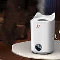 Coral pink and glacier white double spray humidifier with three mist outlets and USB cable