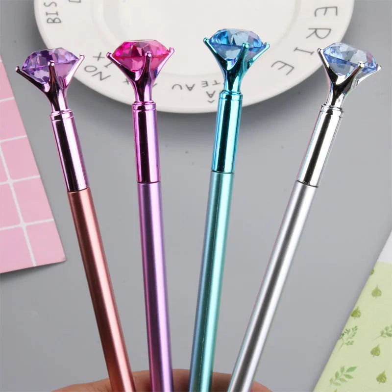 Metallic diamond tip gel pen with black ink, 17cm plastic shell, shown in purple, silver, blue, and pink colour options.