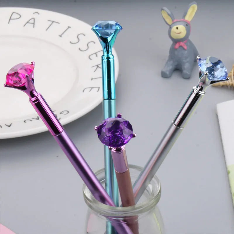 Metallic diamond tip gel pen with black ink, 17cm plastic shell, shown in purple, silver, blue, and pink colour options.