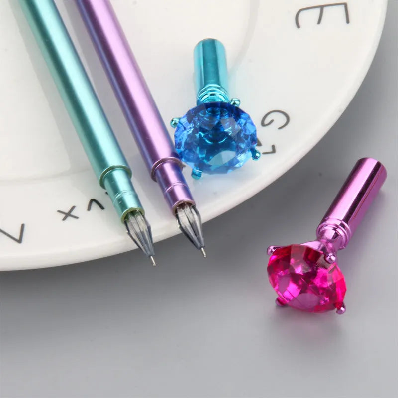 Metallic diamond tip gel pen with black ink, 17cm plastic shell, shown in purple, silver, blue, and pink colour options.