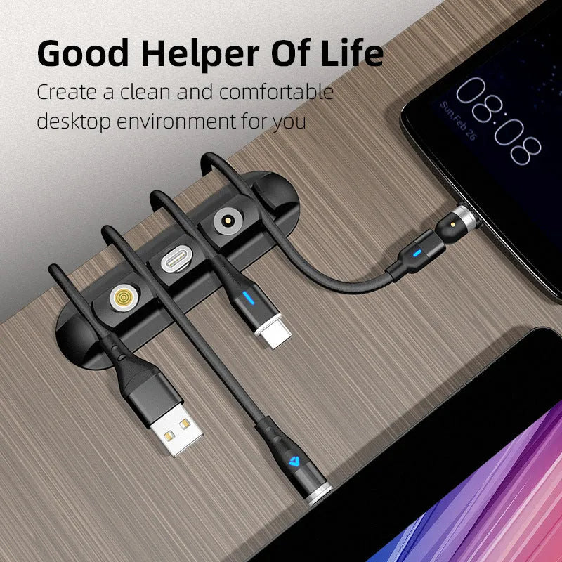 Black soft plastic desktop charging cable organiser with magnetic data cable holders