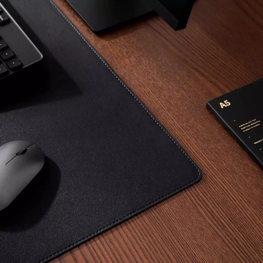 Xiaomi 80x40cm waterproof gaming office mouse pad in black with storage bag on a desk